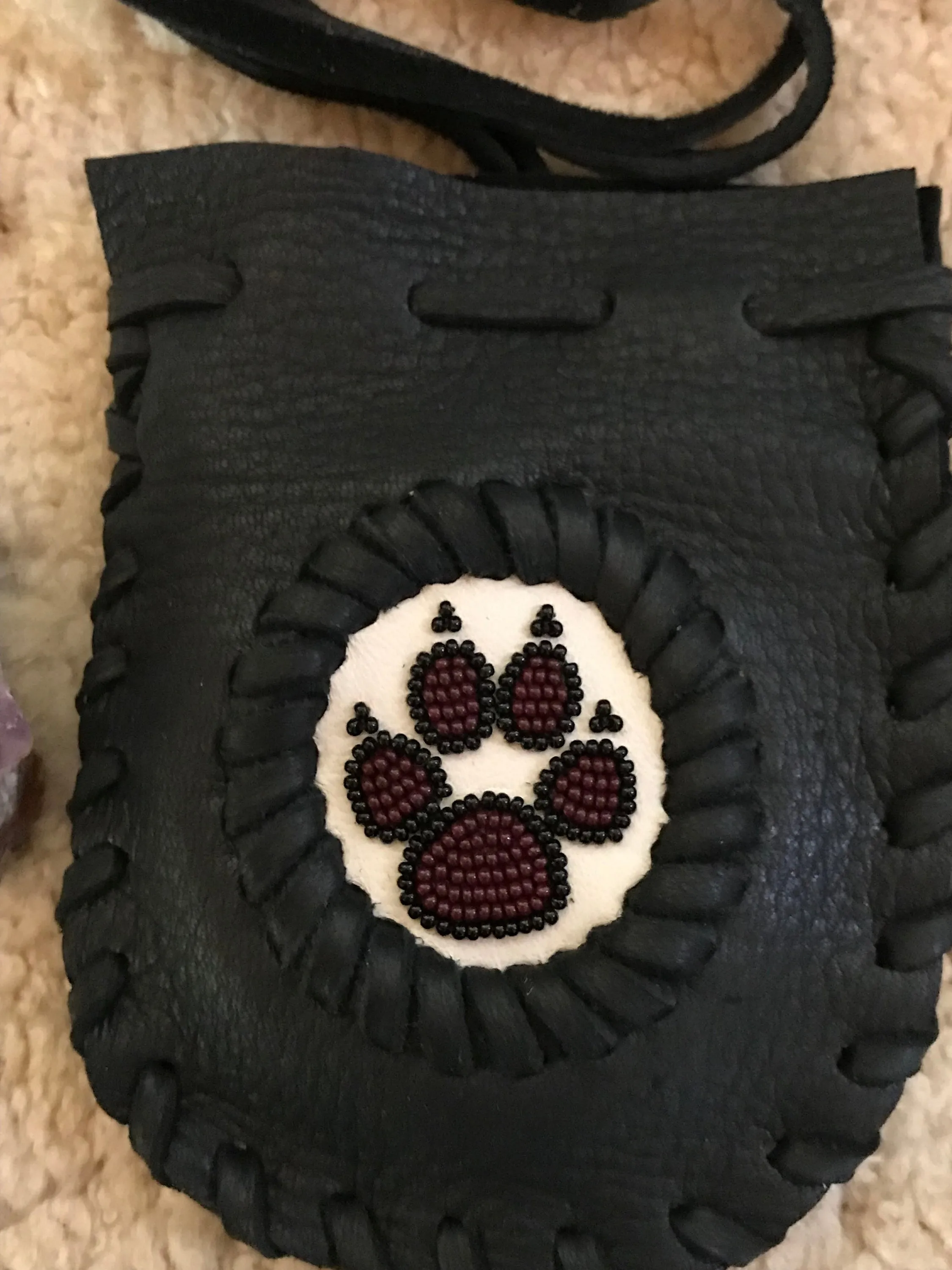 Black beaded wolf paw bag, beaded medicine bag